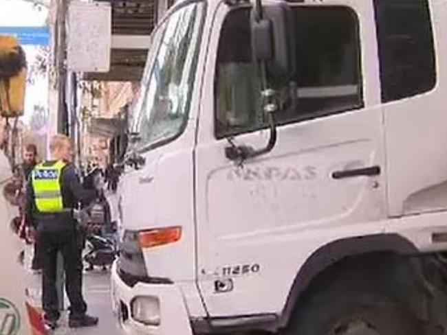 Tragedy has unfolded at one of Melbourne’s most iconic tourist hotspots this morning when a truck driver became pinned against a wall.