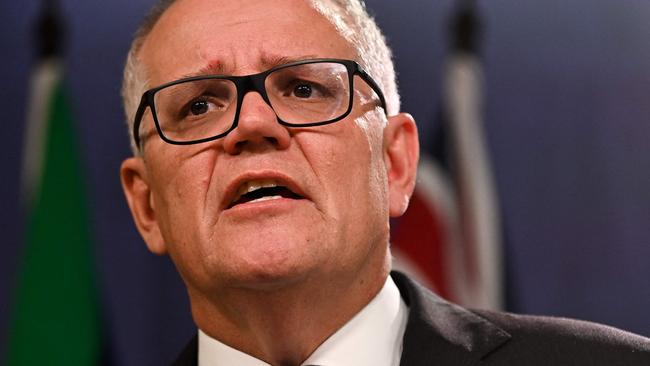 (FILES) Australia's former prime minister Scott Morrison speaks to media during a press conference in Sydney on August 17, 2022. (Photo by Steven Saphore / AFP)