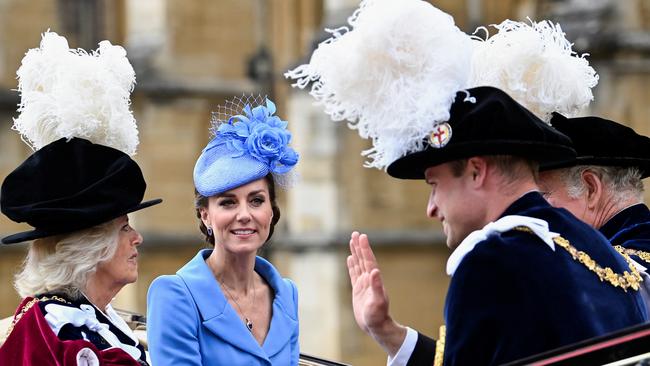 Camilla, Duchess of Cornwall, Catherine, Duchess of Cambridge, Prince Charles, Prince of Wales and Prince William, Duke of Cambridge depart in a carriage for their return journey to the Castle after this year’s Order of the Garter Service. Prince Andrew was not seen in public for the event. Picture; Toby Melville/WPA Pool/Getty Images