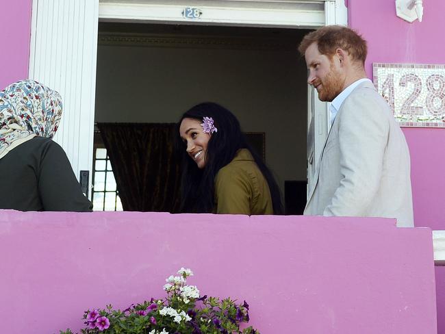 Prince Harry, and Meghan, the Duchess of Sussex, enter a home for tea during a walkabout in Bo-Kaap, Cape Town, South Africa. Picture: African News Agency/AP