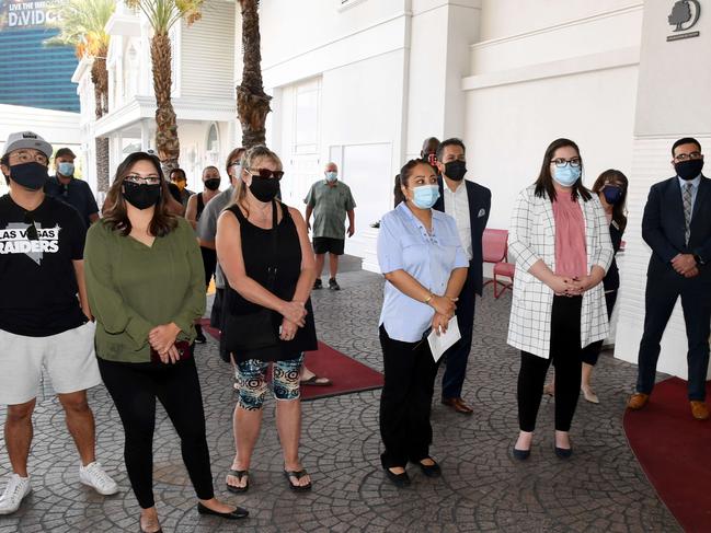 Guests line up along with hotel staff outside the Tropicana Las Vegas just before the Las Vegas Strip resort reopened for the first time since mid-March because of the coronavirus on September 17. Picture: AFP