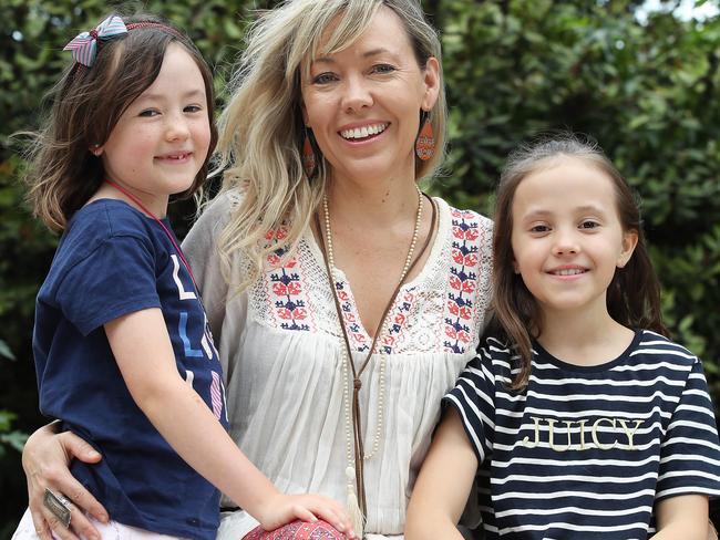 EMBARGO: NEWS NETWORK.Country Singer Felicity Urquhart, pictured in Sydney this week with her two kids, Tia, 9 and Ellie, 7. Felicity understands Australia's mental health crisis first hand after losing her partner to suicide. Picture: David Swift