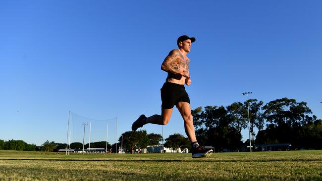 Mitch Robinson trains in isolation at Giffin Park in Brisbane during the AFL shutdown.