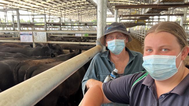 Michael Moran and niece Gretta Gleeson from Lawford Park in Victoria keep a close eye on prices at Naracoorte on Thursday. Picture: Kate Dowler