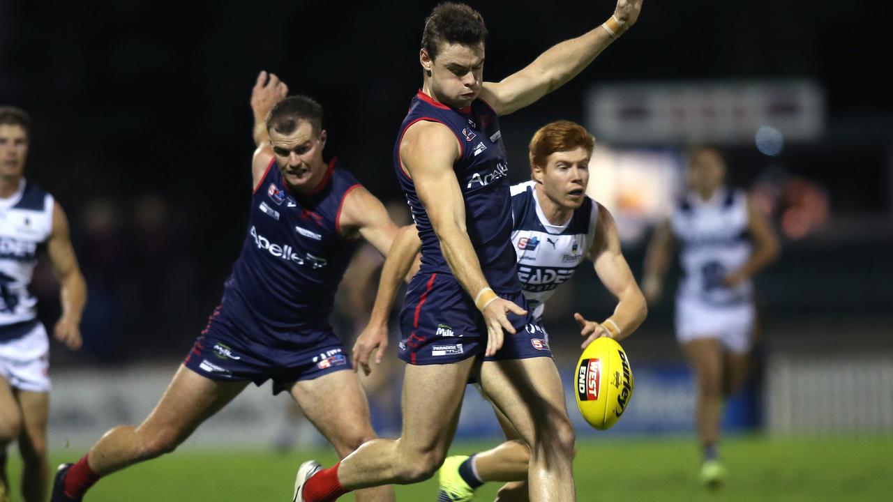 Norwood’s Harry Boyd sends the ball deep into attack against South Adelaide on Friday night. Picture: Dean Martin