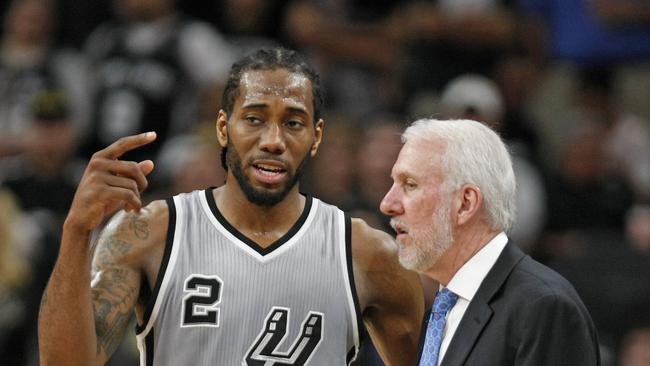 Kawhi Leonard and Gregg Popovich.