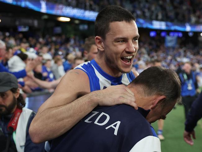 MELBOURNE, AUSTRALIA - AUGUST 03: Luke Davies-Uniacke of the Kangaroos celebrate with Alastair Clarkson, Senior Coach of the Kangaroos after winning the round 21 AFL match between North Melbourne Kangaroos and Richmond Tigers at Marvel Stadium, on August 03, 2024, in Melbourne, Australia. (Photo by Daniel Pockett/Getty Images)