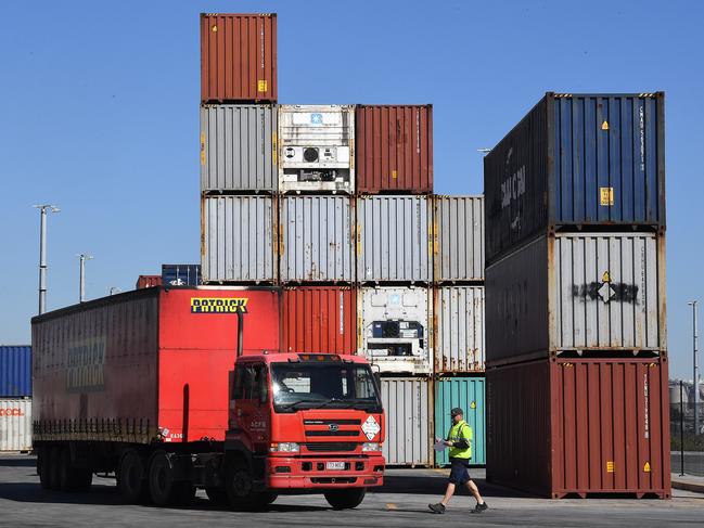 A worker at ACFS Port Logistics in Brisbane. Picture: AAP/Dave Hunt