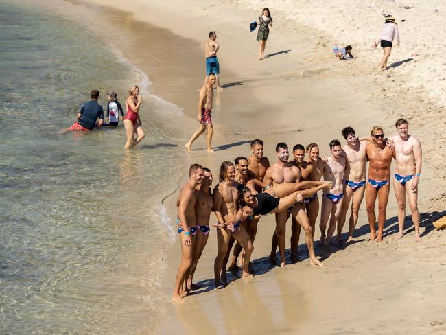 Water polo players pose for a photo at Cottesloe Beach in Perth. Photo:Paul Kane/Getty Images.