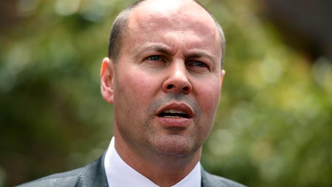 Federal Treasurer Josh Frydenberg speaks at a doorstop during a visit to Riverside Girls High School in Sydney, Tuesday, November 13, 2018. (AAP Image/Joel Carrett) NO ARCHIVING