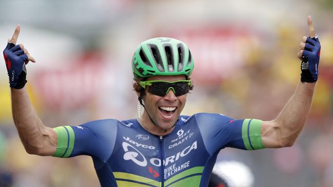 Australia’s Michael Matthews celebrates as he crosses the finish line to win the tenth stage of the Tour de France.