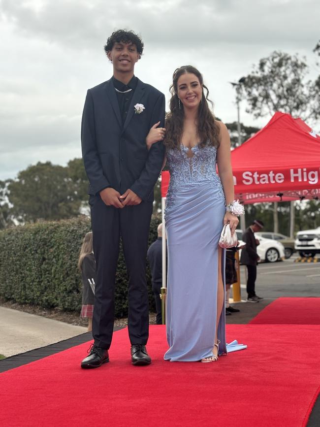 The students of Urangan State High School arriving at their formal.