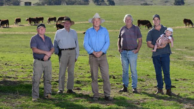 Strathalbyn cattle farmer Peter Manuel, centre, with fellow farmers Brian Neville, Lindsay Gibson, Norm Goodall, Luke Manuel and Wally, 6 months, have been left angered by their council’s 8.3 per cent rate hike. Picture: Brenton Edwards