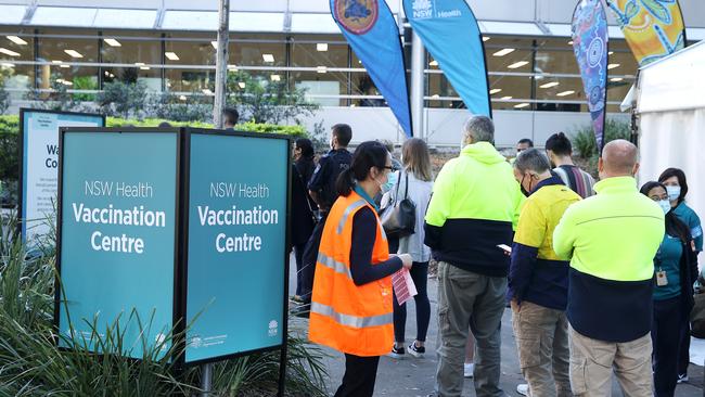 People queue at the mass vaccination centre in Olympic Park in Sydney earlier this month. Picture: Mark Kolbe/Getty Images