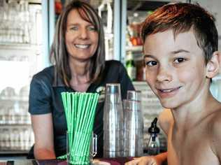 ENVIRONMENT ALLY FRIENDLY: Tannum Sands Surf Club's Marisa Kent with Sid Crawshaw, 10, whose plastic-free campaign prompted the club to ban plastic straws. Picture: Hayley Bracewell Photography