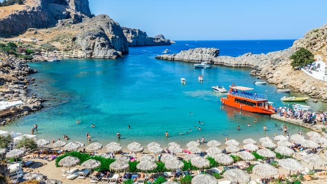 In summer, expect queues, even for the local ferry. St. Paul's Bay in Rhodes, Greece. Picture: Getty