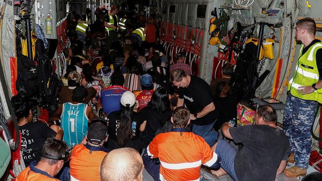 Evacuees strap in before takeoff. Picture: Supplied.