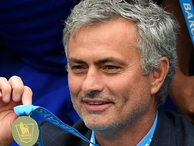 LONDON, ENGLAND - MAY 24: Jose Mourinho manager of Chelsea shows his champion's medal after the Barclays Premier League match between Chelsea and Sunderland at Stamford Bridge on May 24, 2015 in London, England. (Photo by Michael Regan/Getty Images)