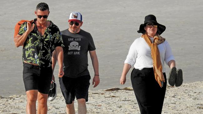 US actor Melissa McCarthy out for a walk with her actor husband Ben Falcone and actor Luke Evans in Byron Bay. Picture: Nathan Edwards.