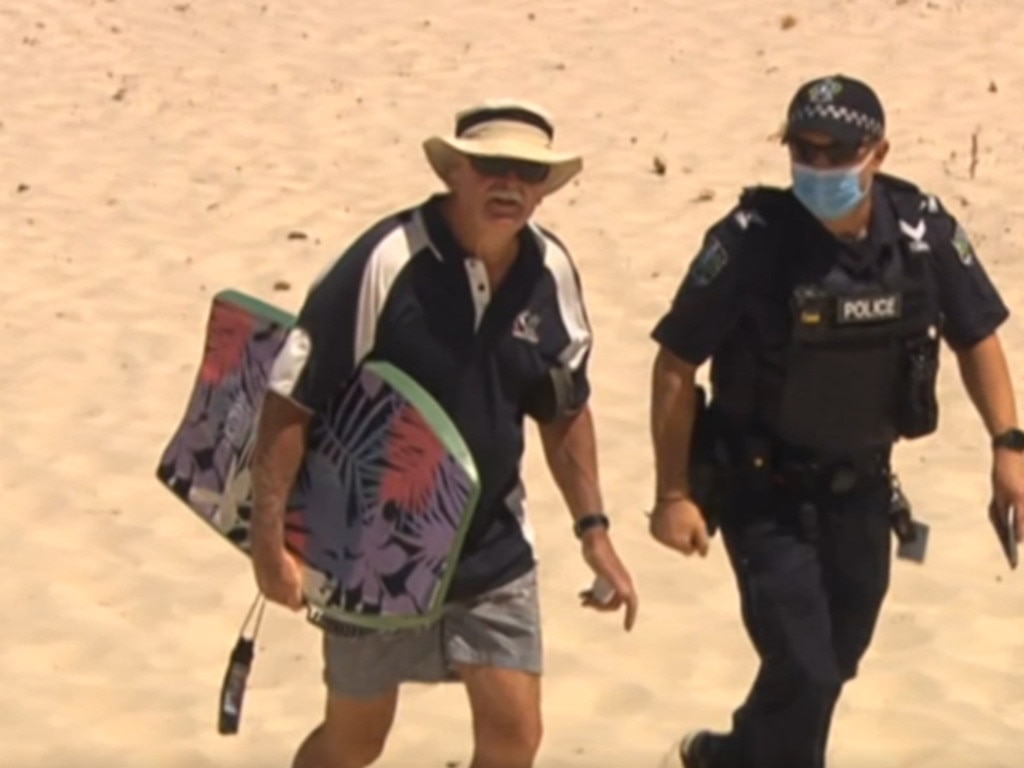 Onlooker Michael Napper (left) had been in the water with his grandchildren when he watched the situation unfold. Picture: 7 News