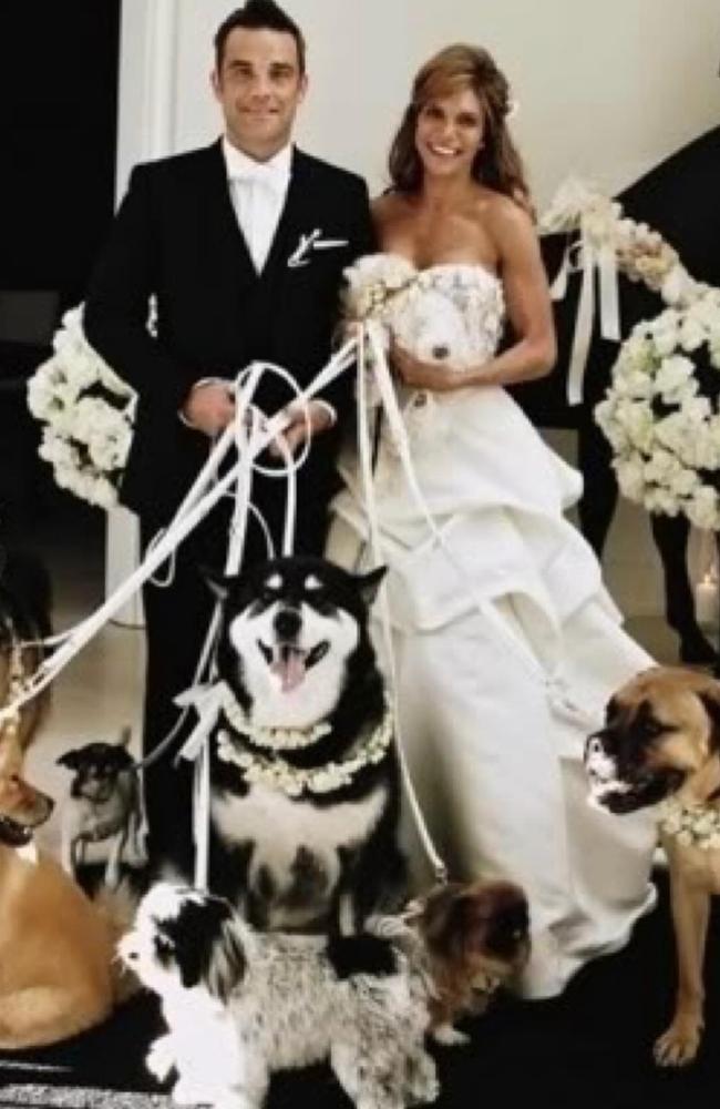 Ayda shared a carousel of photos throughout the years with the couple's dogs, including a sweet snap from their 2010 wedding day.