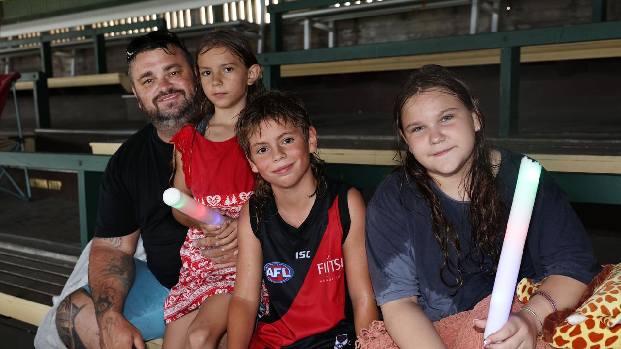 Andrew Frew, Rebel Frew, 7, Chayse Frew, 8, and Billie Frew, 12, at the Cairns Churches Joy to the World Community Carols, held at the Cairns Showgrounds. Picture: Brendan Radke