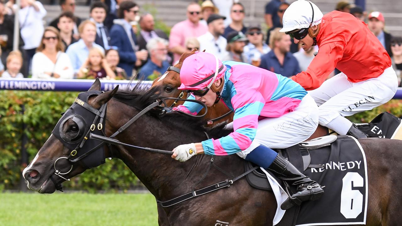 Billy Egan (red jacket) was narrowly denied an Australian Guineas win aboard Cherry Tortoni by $301 outsider Lunar Fox. Picture: Racing Photos via Getty Images