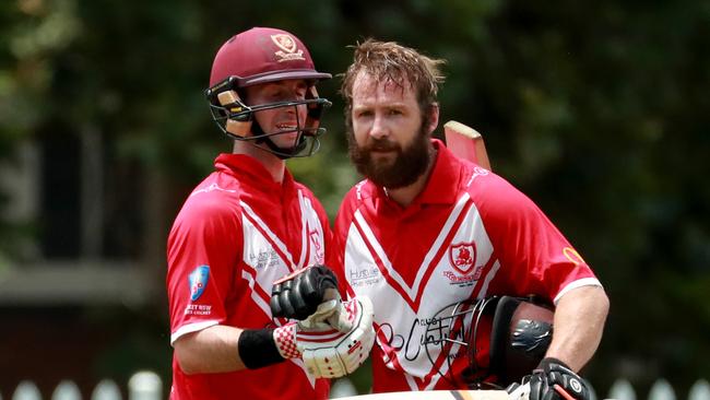 Men of the moment. English cricketer Mark Stoneman of St George celebrates his century with Luke Bartier.