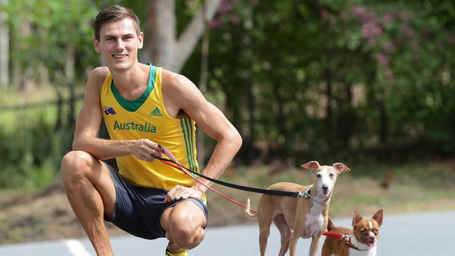 Dane Bird-Smith walking with his dogs Pina and Rocky. Pic: Peter Wallis