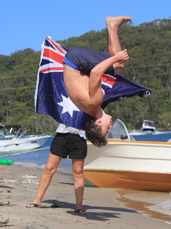Gold Coast gymnast Josh Sharkey celebrating Australia Day at Tallebudgera Creek. Photo: Scott Powick.