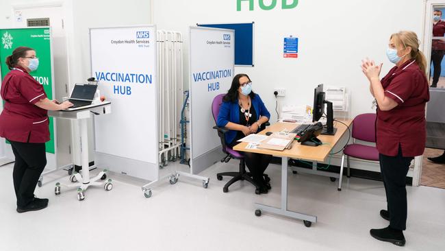 Medical staff at the Vaccination Hub at Croydon University Hospital in south London on December 8 where the Pfizer/BioNTech Covid-19 vaccine is being administered. Picture: AFP