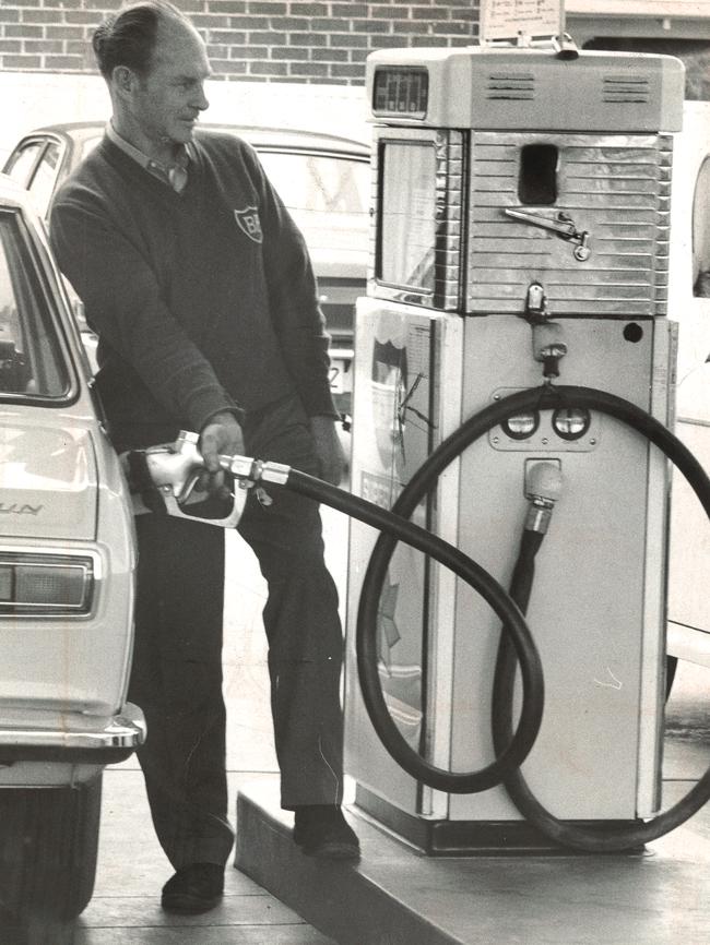 Ron Neale fills a car with petrol at the BP station on Marion Rd at South Plympton in 1972.