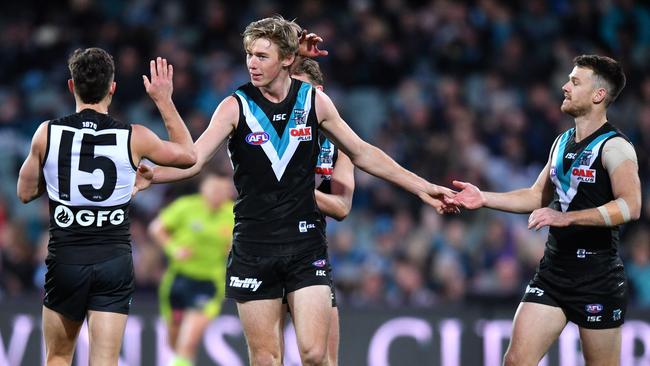 Young gun Todd Marshall celebrates a goal against Fremantle. Picture: AAP Image/David Mariuz