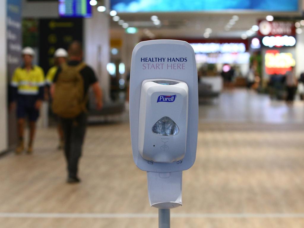 A hand sanitiser available for passengers to use at the Cairns Airport domestic terminal. Picture: Brendan Radke