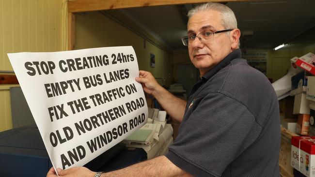 Business owner Joe Laviano (Colonial Print and Copy), poses for a photo at his Printing store in Baulkham Hills today, November 1, 2018. Local business owners including Joe are angry after being told a "peak hour" bus lane outside their shops on Old Northern Rd will be changed to a 24 hour bus lane, and they will lose parking for their customers. (AAP Image/David Swift)