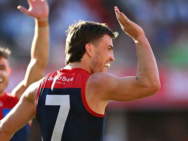 GOLD COAST, AUSTRALIA - AUGUST 17: Jack Viney of the Demons celebrates with team mates after kicking a goal during the round 23 AFL match between Gold Coast Suns and Melbourne Demons at People First Stadium, on August 17, 2024, in Gold Coast, Australia. (Photo by Albert Perez/AFL Photos via Getty Images)