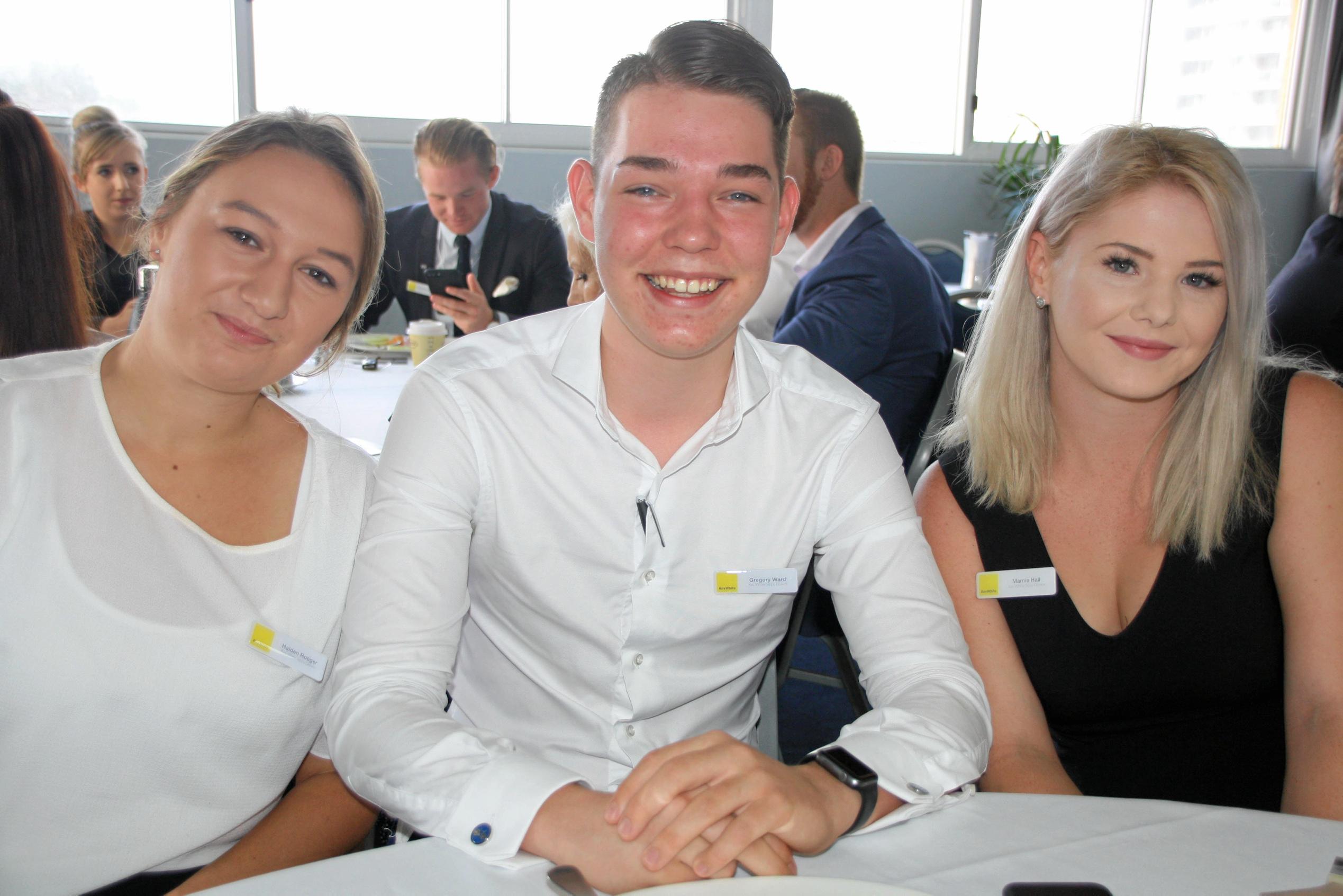 ?Haiden Roeger, Gregory Ward and Marnie Hall of Ray White Mountain Creek at the Maroochy Surf Club. Picture: Erle Levey