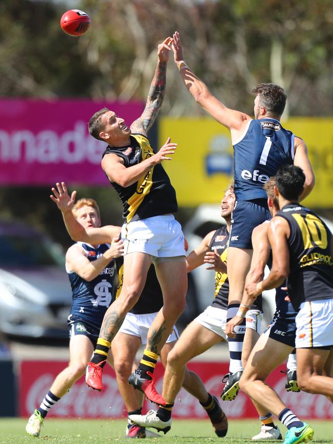 Glenelg recruit Jesse White goes up against South co-captain Keegan Brooksby. PIC: TAIT SCHMAAL.