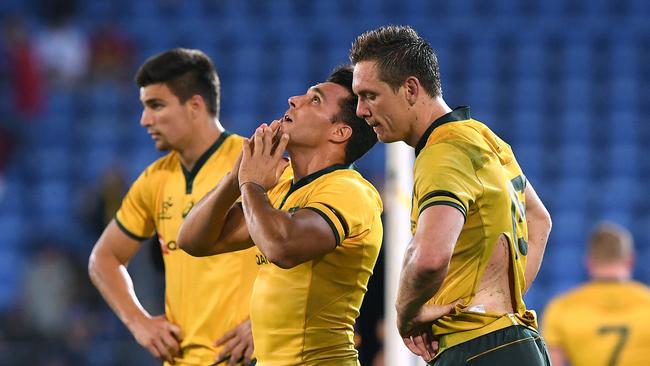 Wallabies player Nick Phipps (centre) reacts following  the Rugby Championship match between Australia and Argentina at Cbus Super Stadium on the Gold Coast, Saturday, September 15, 2018. (AAP Image/Dave Hunt) NO ARCHIVING, EDITORIAL USE ONLY