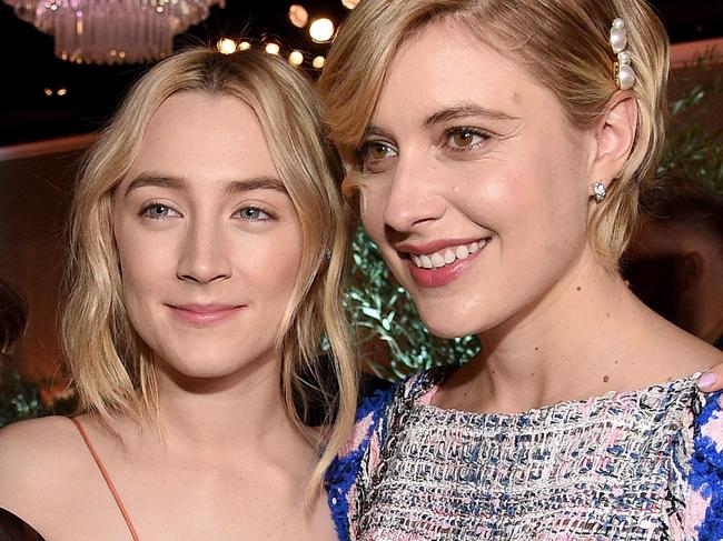 BEVERLY HILLS, CA - FEBRUARY 05:  (L-R) Actors Laurie Metcalf and Saoirse Ronan and director Greta Gerwig attend the 90th Annual Academy Awards Nominee Luncheon at The Beverly Hilton Hotel on February 5, 2018 in Beverly Hills, California.  (Photo by Kevork Djansezian/Getty Images)