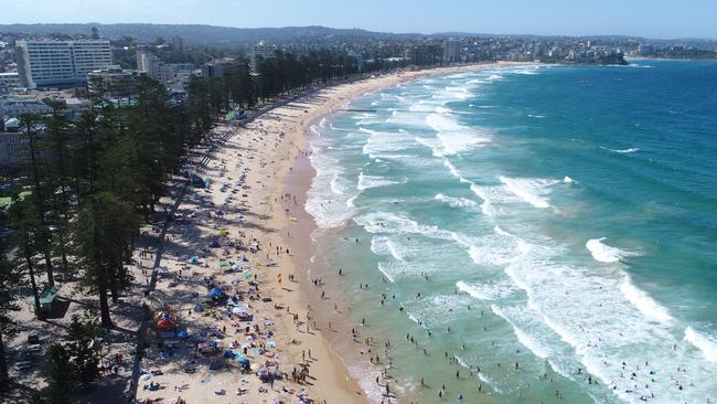 Crowds cool off at Manly beach. Picture: Damian Shaw