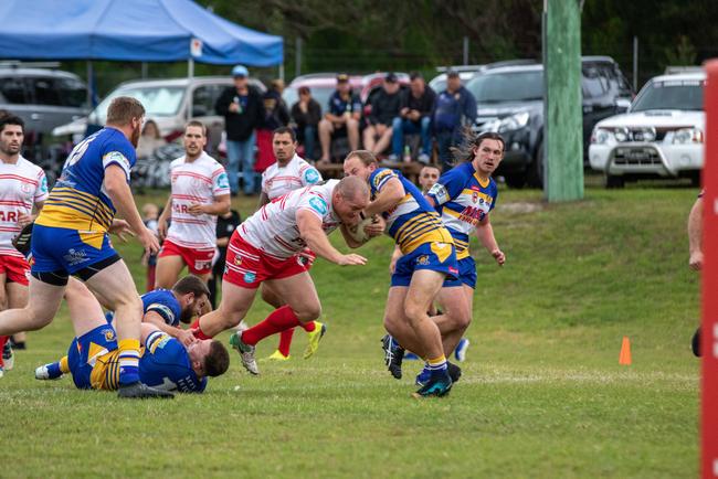 Byron Bay front-rower Dylan Montgomery on the run in NRRRL.