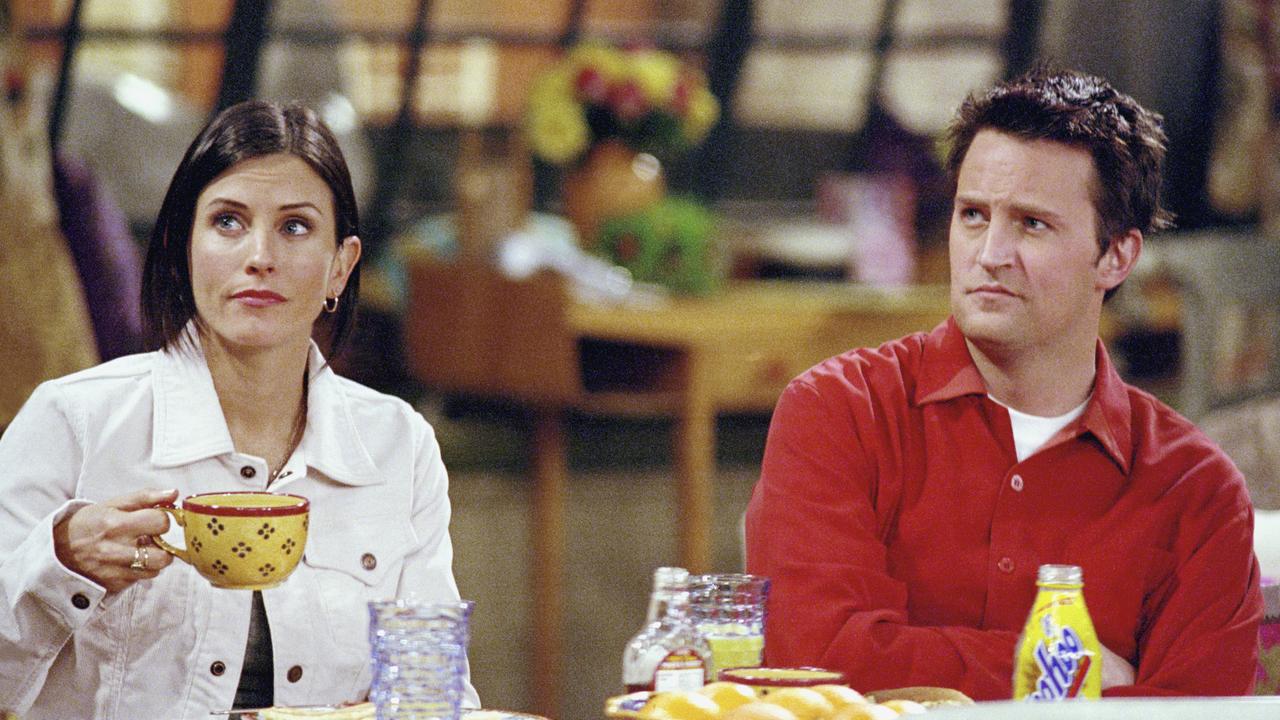 Cox with Matthew Perry, who played her on-screen husband Chandler.