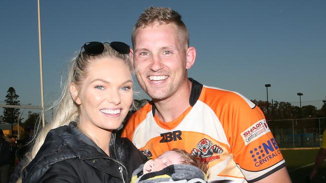 Killick with his wife Alexis and baby Avaliah after the team’s 2019 grand final victory. (AAP Image/Sue Graham