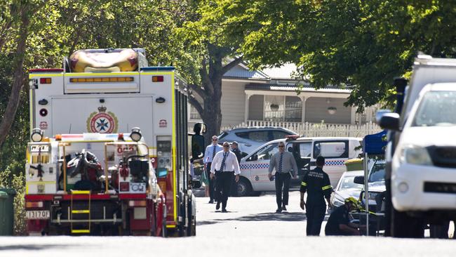 Police and fire investigators at the crime scene following the fatal house fire on Monday, December 16, 2019. Picture: Kevin Farmer