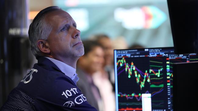 Traders work on the floor of the New York Stock Exchange. Picture: AFP