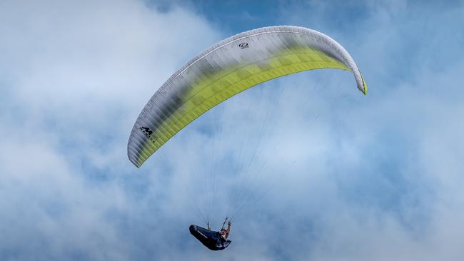 A paraglider at Merewether near Glenrock Reserve. Picture: Ron Bonham