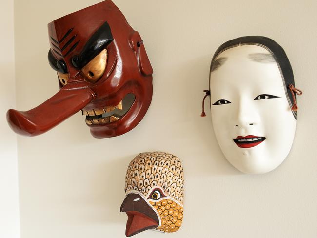 At Home page with Celebrity Chef Lyndey Milan. various masks from travels