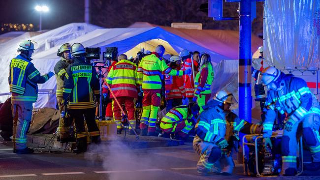 Emergency services at work in Magdeburg, Germany, where a car ploughed into Christmas shoppers at a night market. Picture: Craig Stennett / Getty