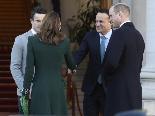 Prince William and Kate went gloveless as they shook hands with Irish Prime Minister Leo Varadkar and his partner Matthew Barrett, in Dublin. Picture: AP